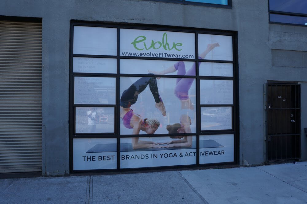 Evolve Fitness Wear Printed Perforated Window Graphics Portland - outdoor & retail signs