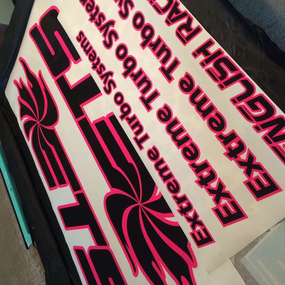Extreme Turbo Systems Printed Neon Pink Racecar Graphics - outdoor & retail signs